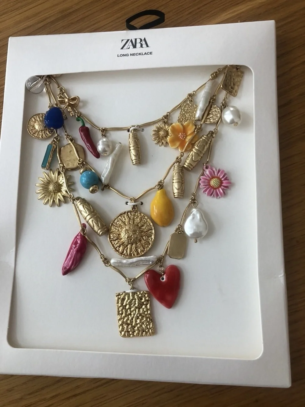 Zara Gold Multi-Charm Layered Necklace with Red, Blue and Pink Accents - Picture 4 of 7